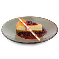 Warm cheesecake with cranberry sauce