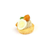 3553. Mushroom mousse with quail egg and truffle oil on toast