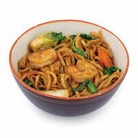 Udon noodles with Pak Choi cabbage, mushrooms and tiger prawns in japanese Yakisoba sauce