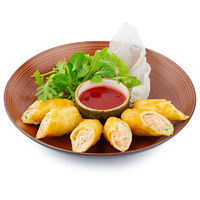 Crispy rolls stuffed with shrimps and cheese